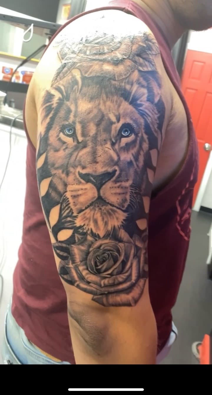 Black & Grey + Realism lion tattoo on Upper Arm by KD_INKORPORATED on TattMe