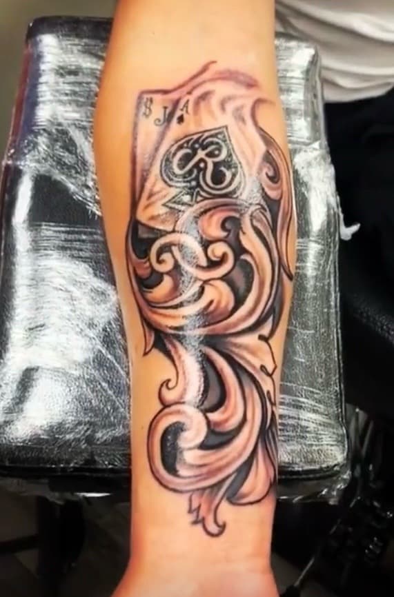 Black & Grey + Illustrative playing card tattoo on Forearm by KD_INKORPORATED on TattMe