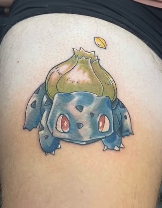 Color + Anime bulbasaur tattoo on Thigh by KD_INKORPORATED on TattMe