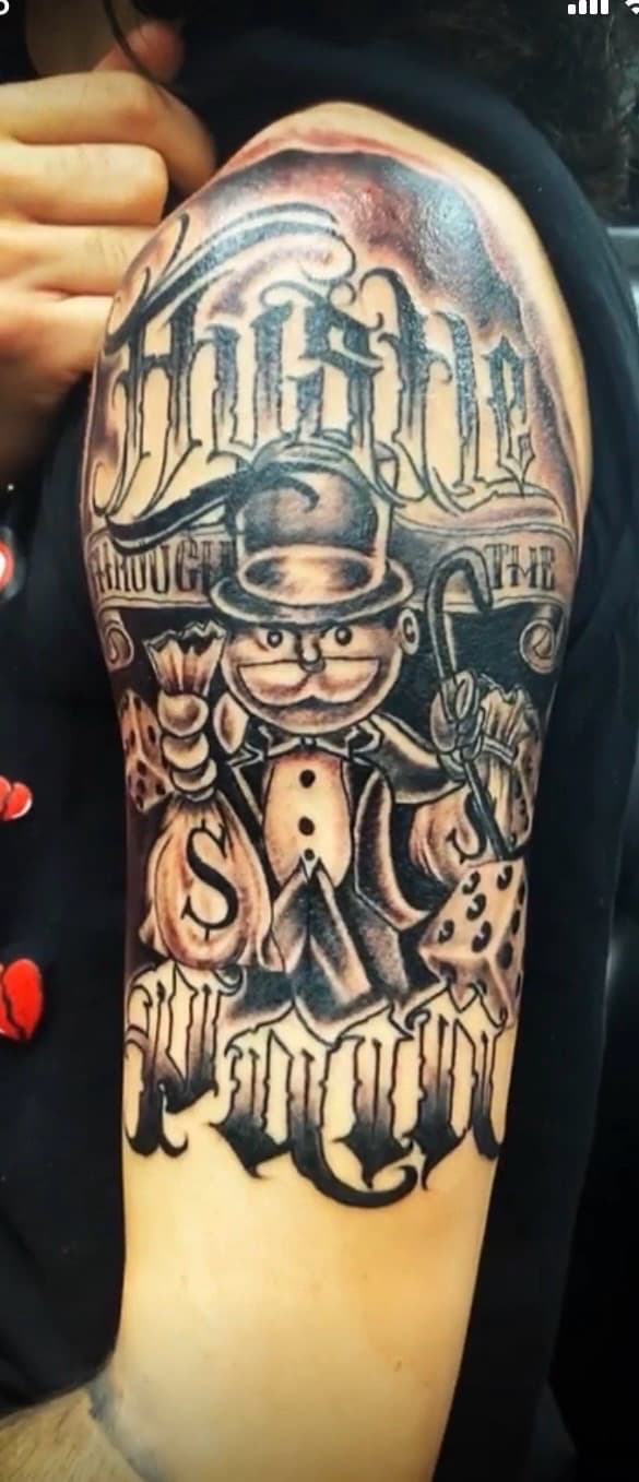 Black & Grey + Chicano monopoly man tattoo on Upper Arm by KD_INKORPORATED on TattMe
