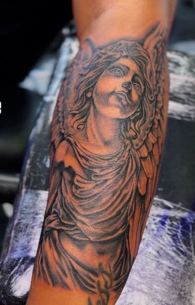 Black & Grey + Realism angel tattoo on Forearm by KD_INKORPORATED on TattMe