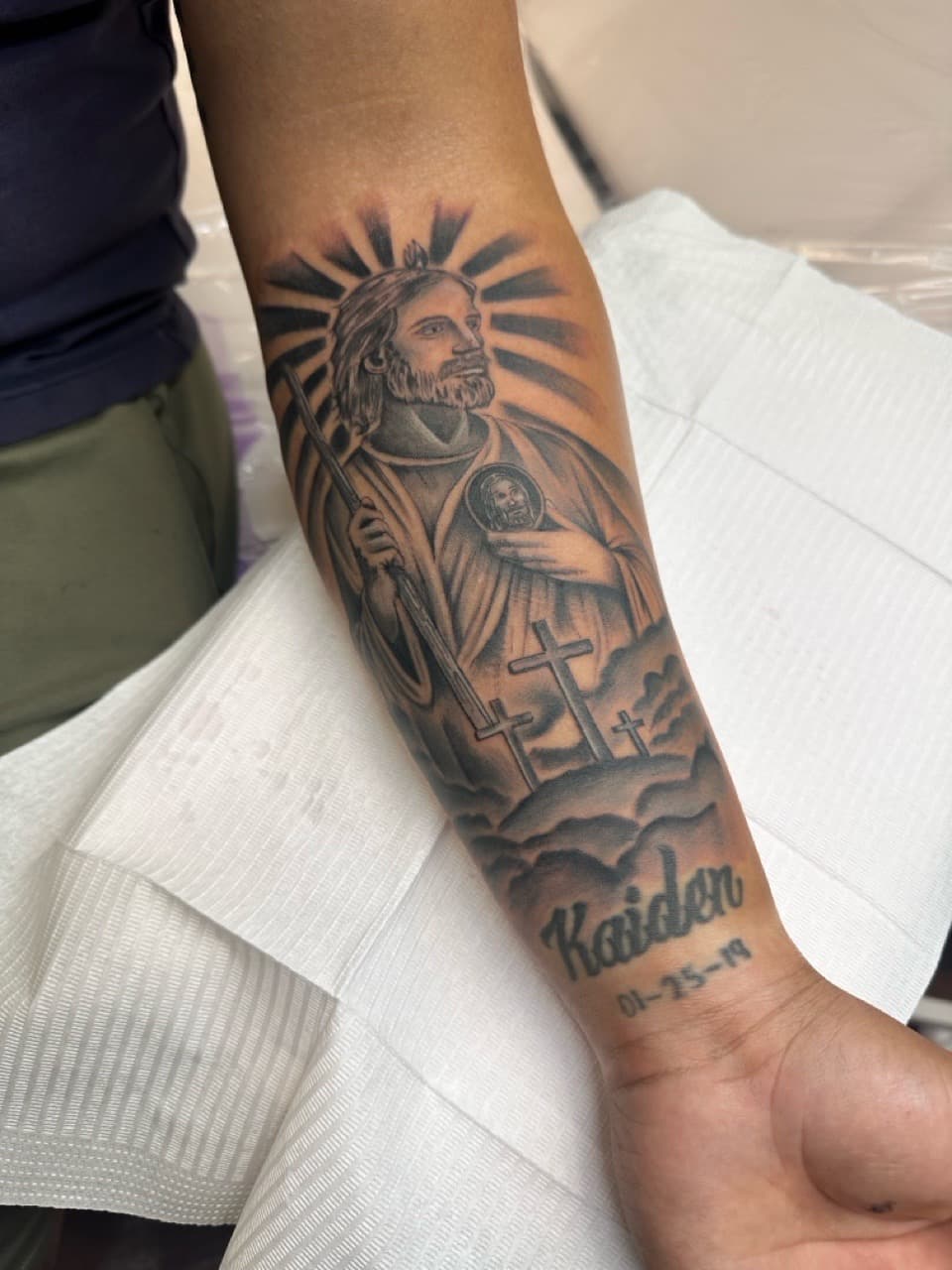 Black & Grey + Illustrative saint tattoo on Forearm by The_Body_Art_Surgeon on TattMe