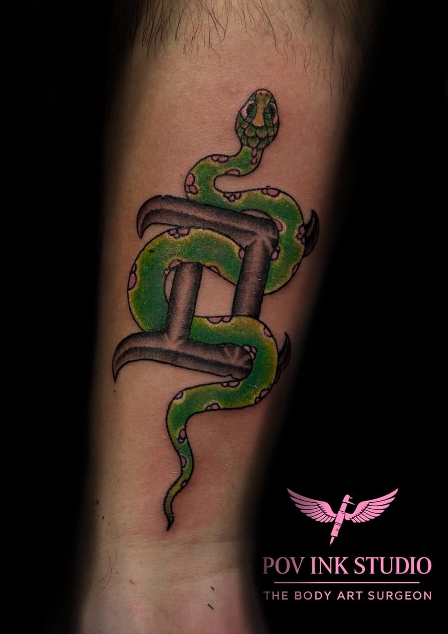 Color + Illustrative snake tattoo on Forearm by The_Body_Art_Surgeon on TattMe