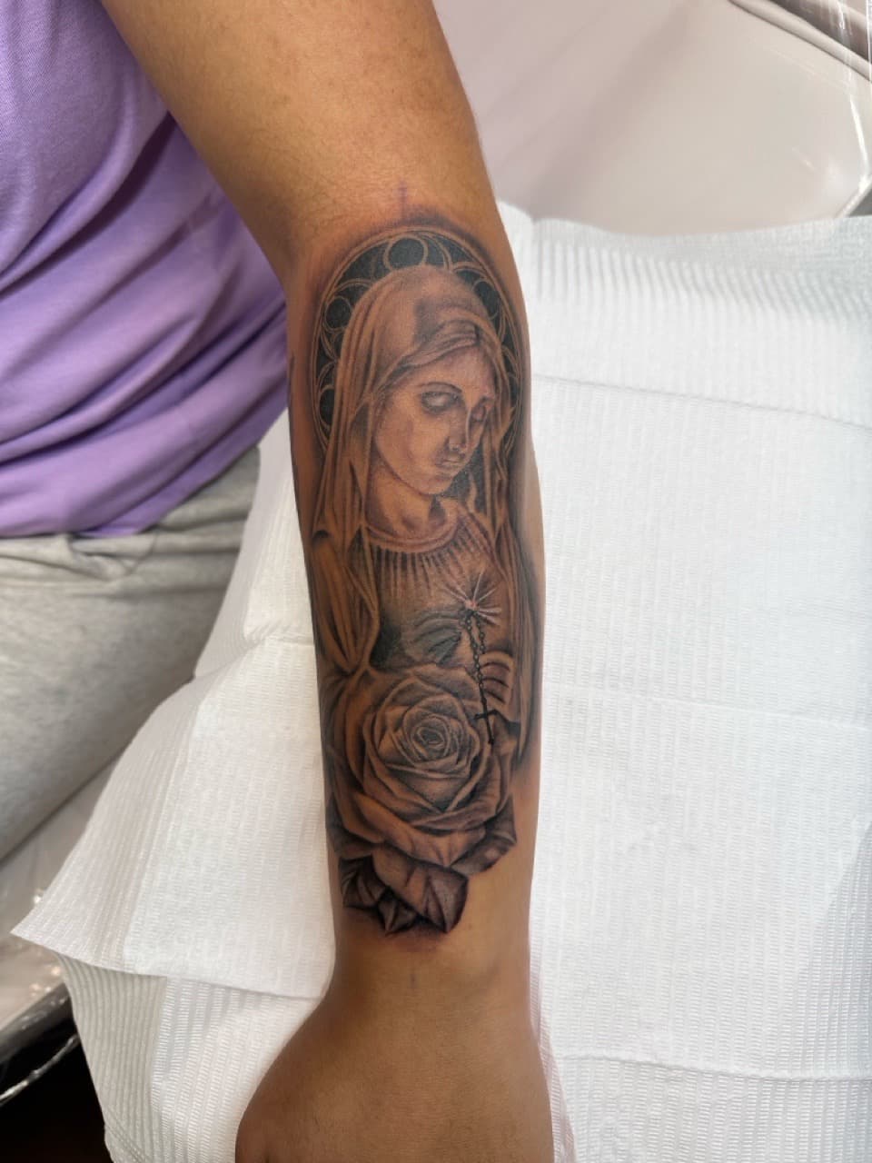 Black & Grey + Realism virgin mary tattoo on Forearm by The_Body_Art_Surgeon on TattMe
