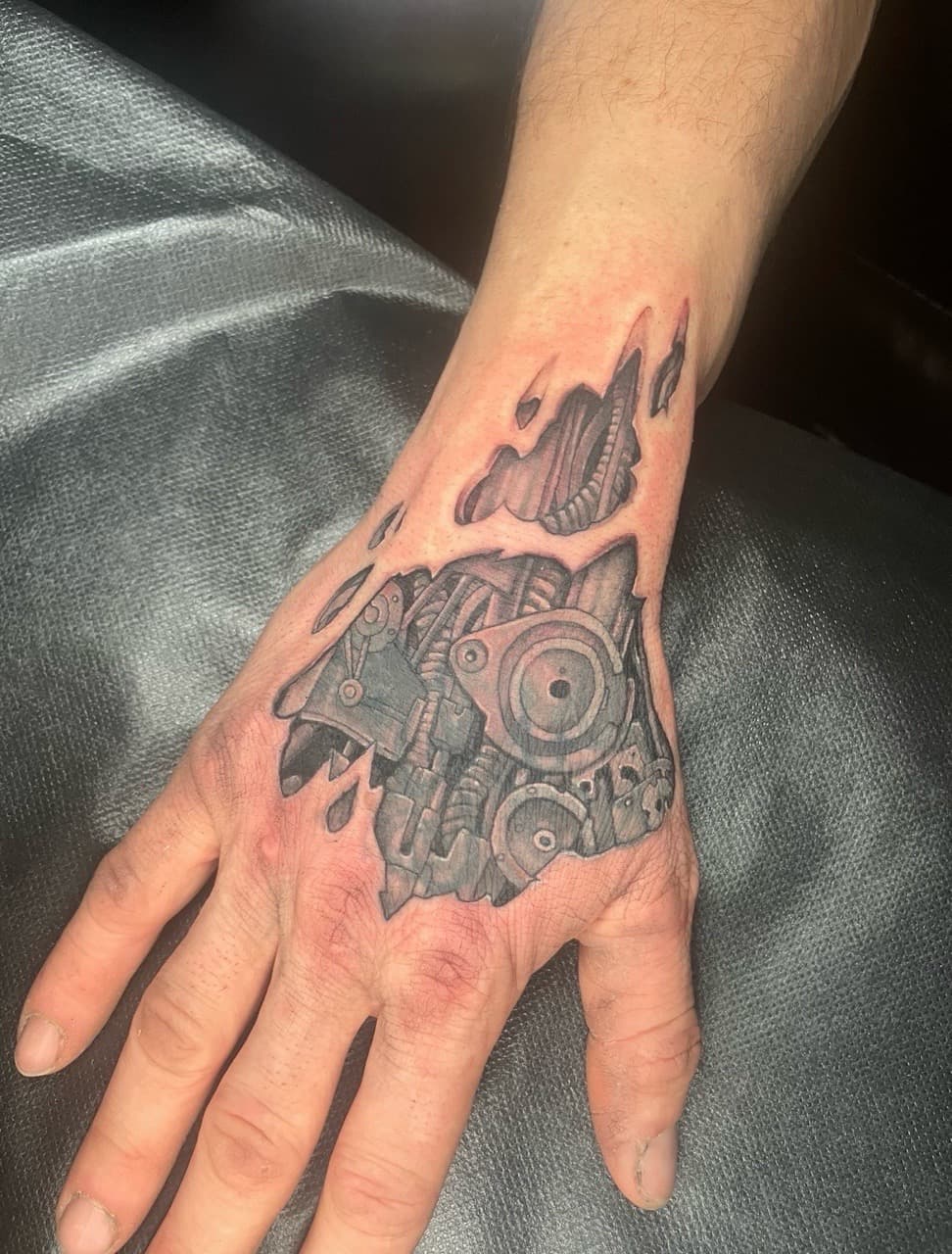 Black & Grey + Biomechanical robot tattoo on Hand by Inksworth on TattMe