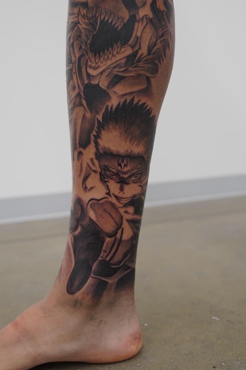 Black & Grey + Anime manga tattoo on Calf by Upside_Tattoo on TattMe