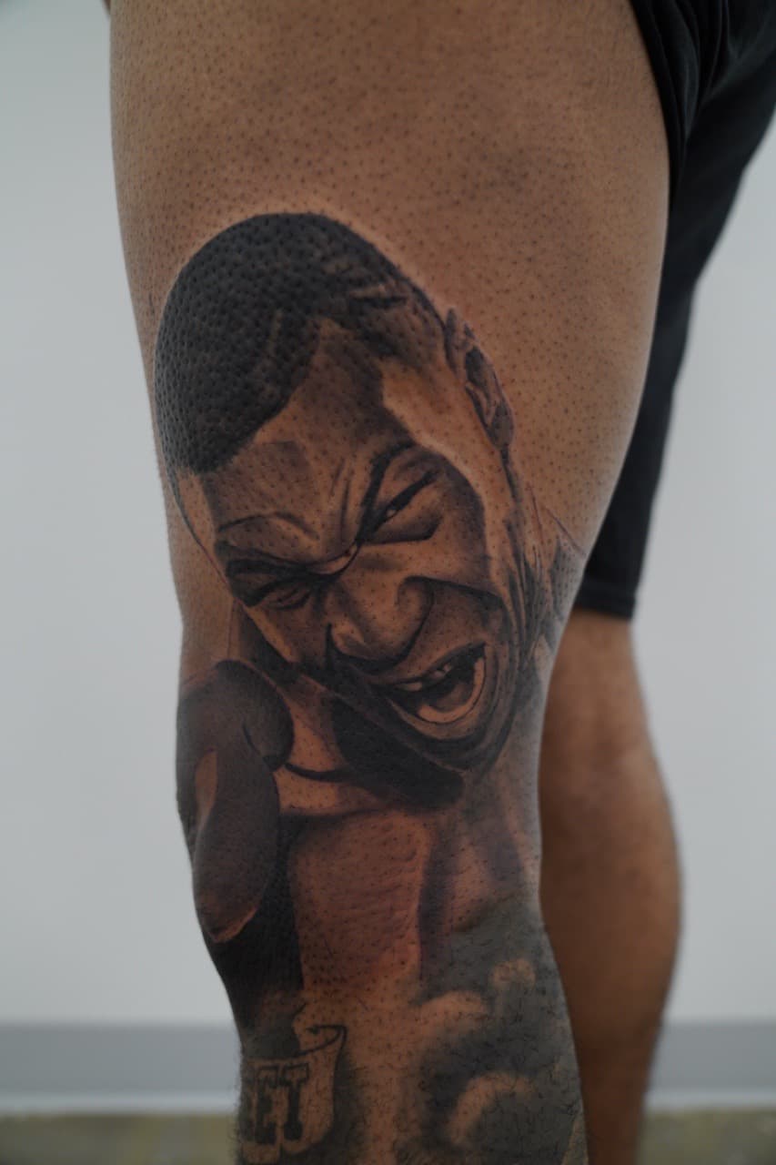 Realism + Black & Grey man tattoo on Knee by Upside_Tattoo on TattMe