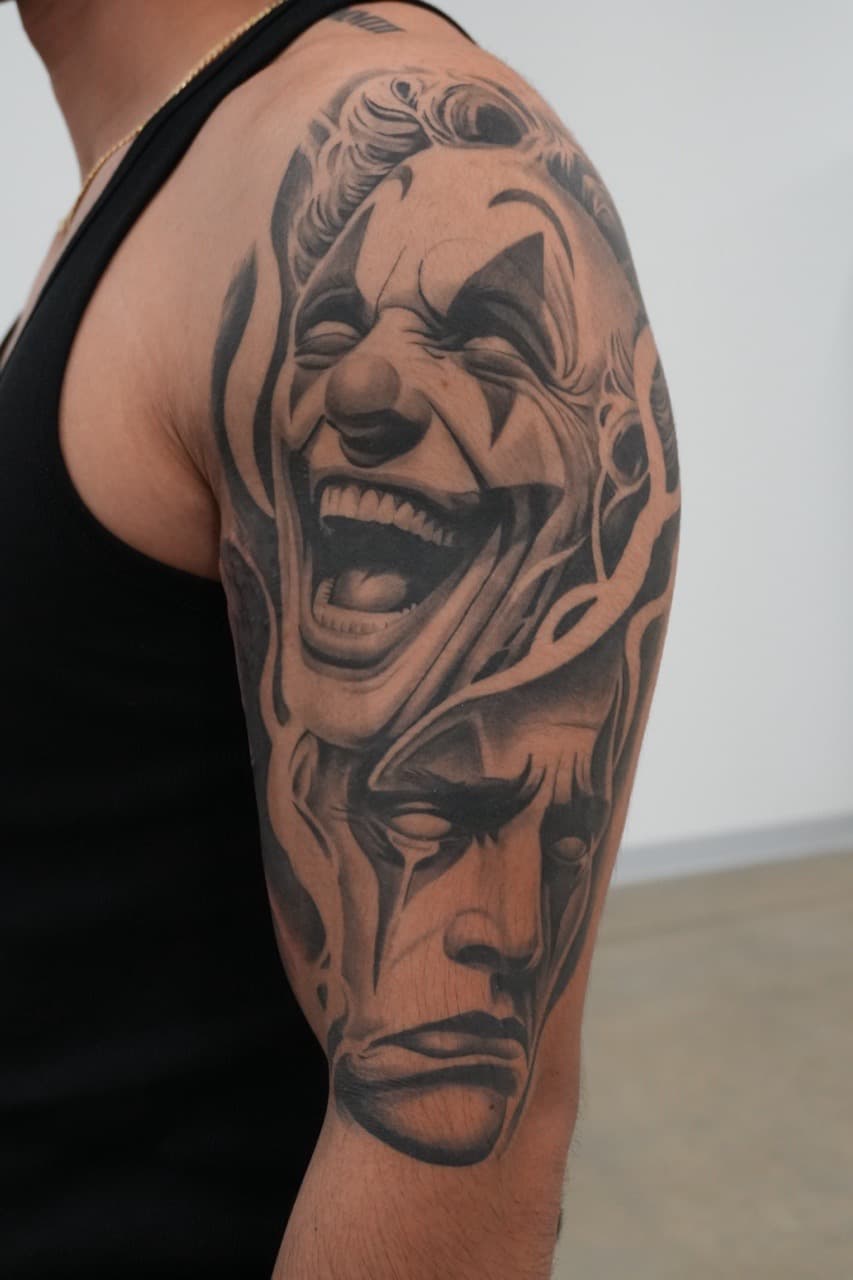 Black & Grey + Realism clown tattoo on Upper Arm by Upside_Tattoo on TattMe