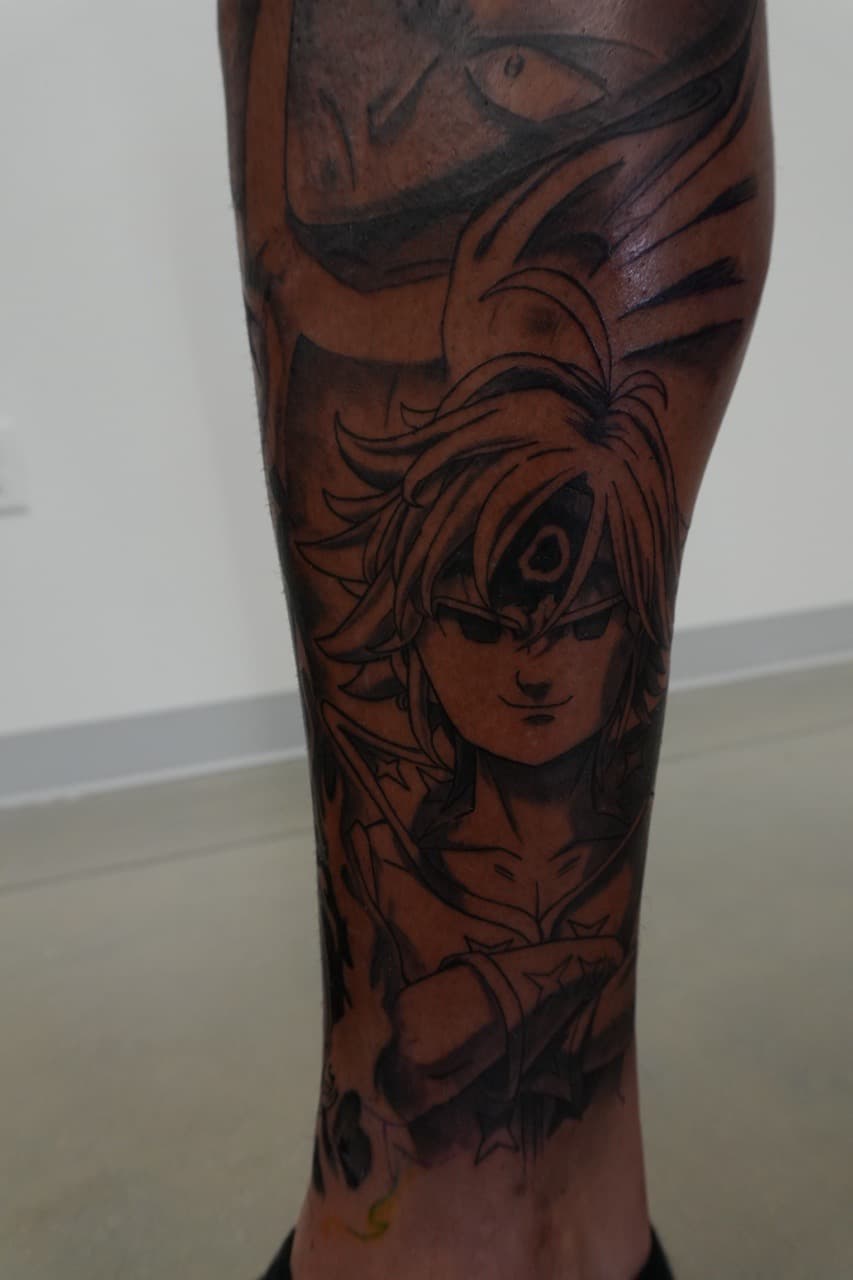 Anime + Black & Grey anime character tattoo on Calf by Upside_Tattoo on TattMe
