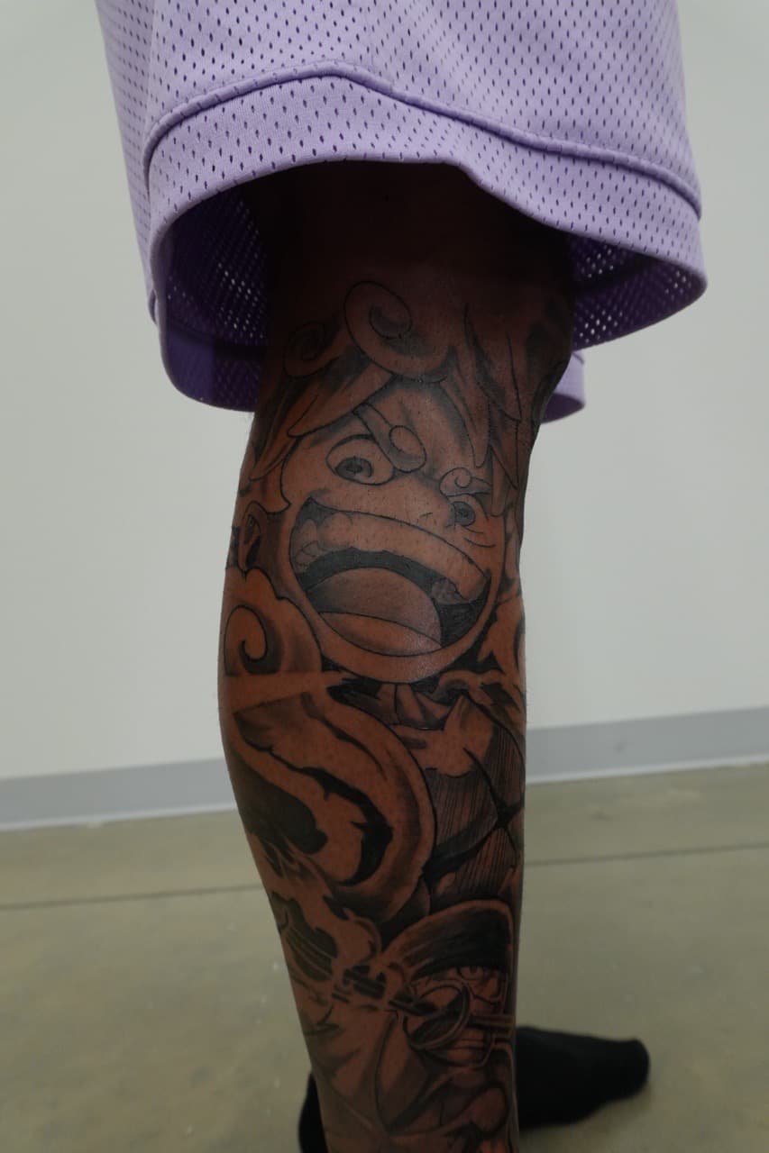 Black & Grey + Illustrative face tattoo on Calf by Upside_Tattoo on TattMe