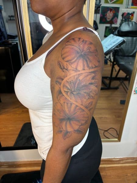 Floral + Black & Grey hibiscus tattoo on Half Sleeve by Bizzarreink on TattMe