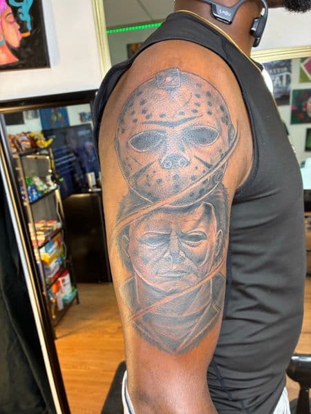 Black & Grey + Realism jason voorhees tattoo on Upper Arm by Bizzarreink on TattMe