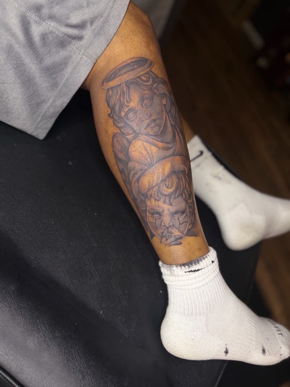 Black & Grey + Realism angels tattoo on Calf by Pooh_Ink on TattMe