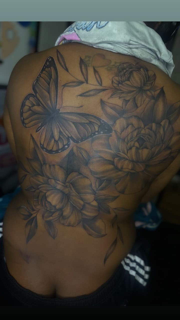 Black & Grey + Floral butterfly tattoo on Upper Back by Pooh_Ink on TattMe