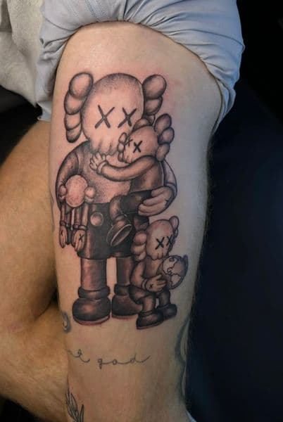 Black & Grey + Illustrative kaws tattoo on Thigh by Incredible_Ink on TattMe