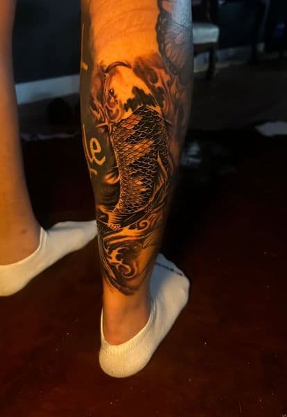 Black & Grey + Japanese koi fish tattoo on Calf by Incredible_Ink on TattMe