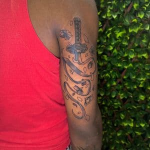 Black & Grey + Illustrative katana tattoo on Upper Arm by Edwaun_Randall on TattMe