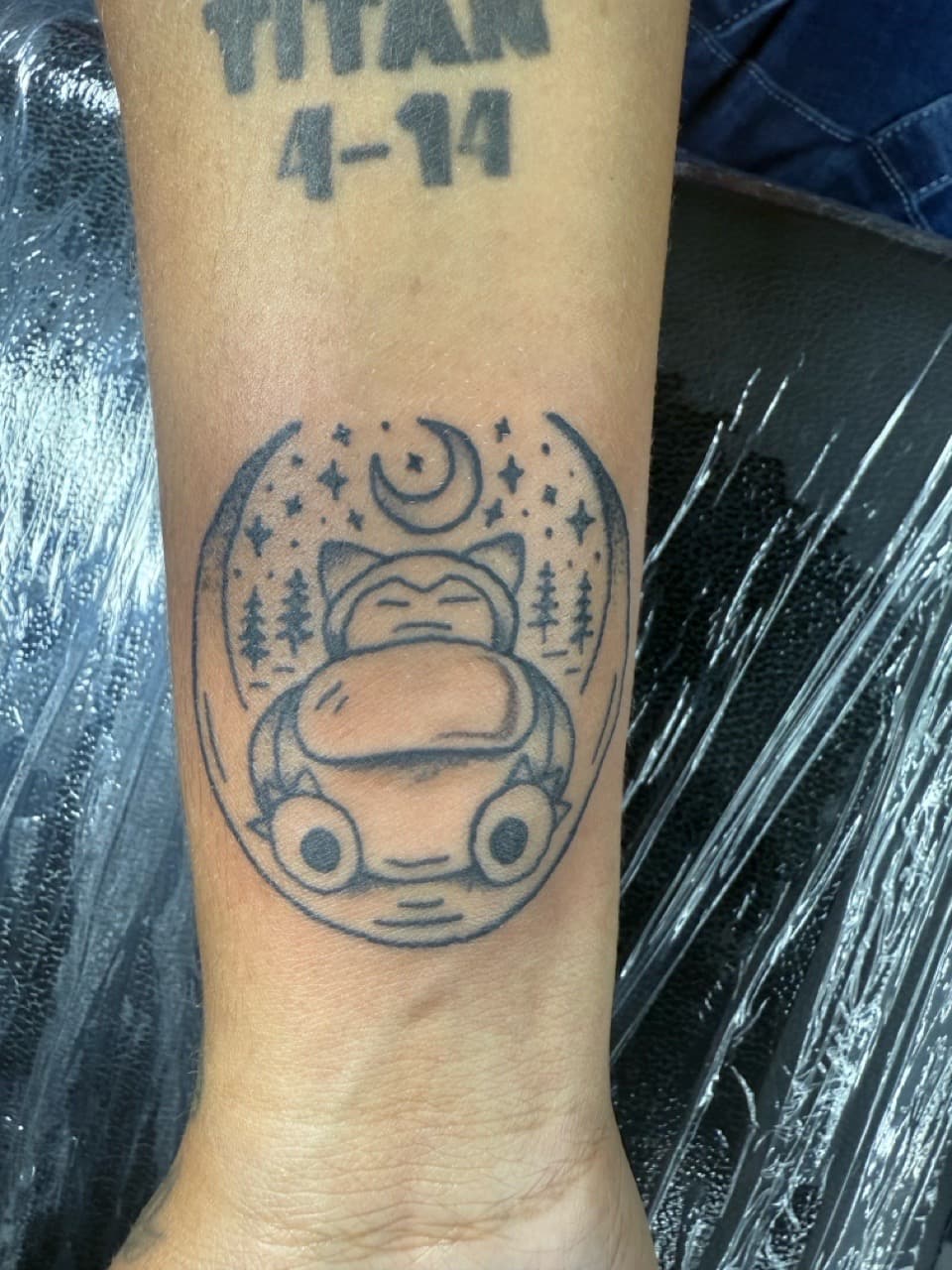 Illustrative + Black-work snorlax tattoo on Wrist by Edwaun_Randall on TattMe