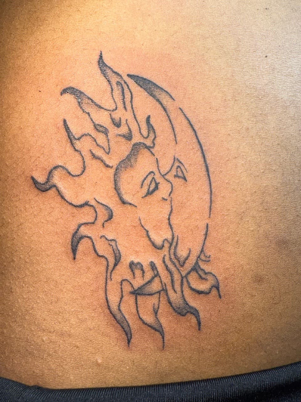 Line-work + Black-work sun tattoo by Edwaun_Randall on TattMe