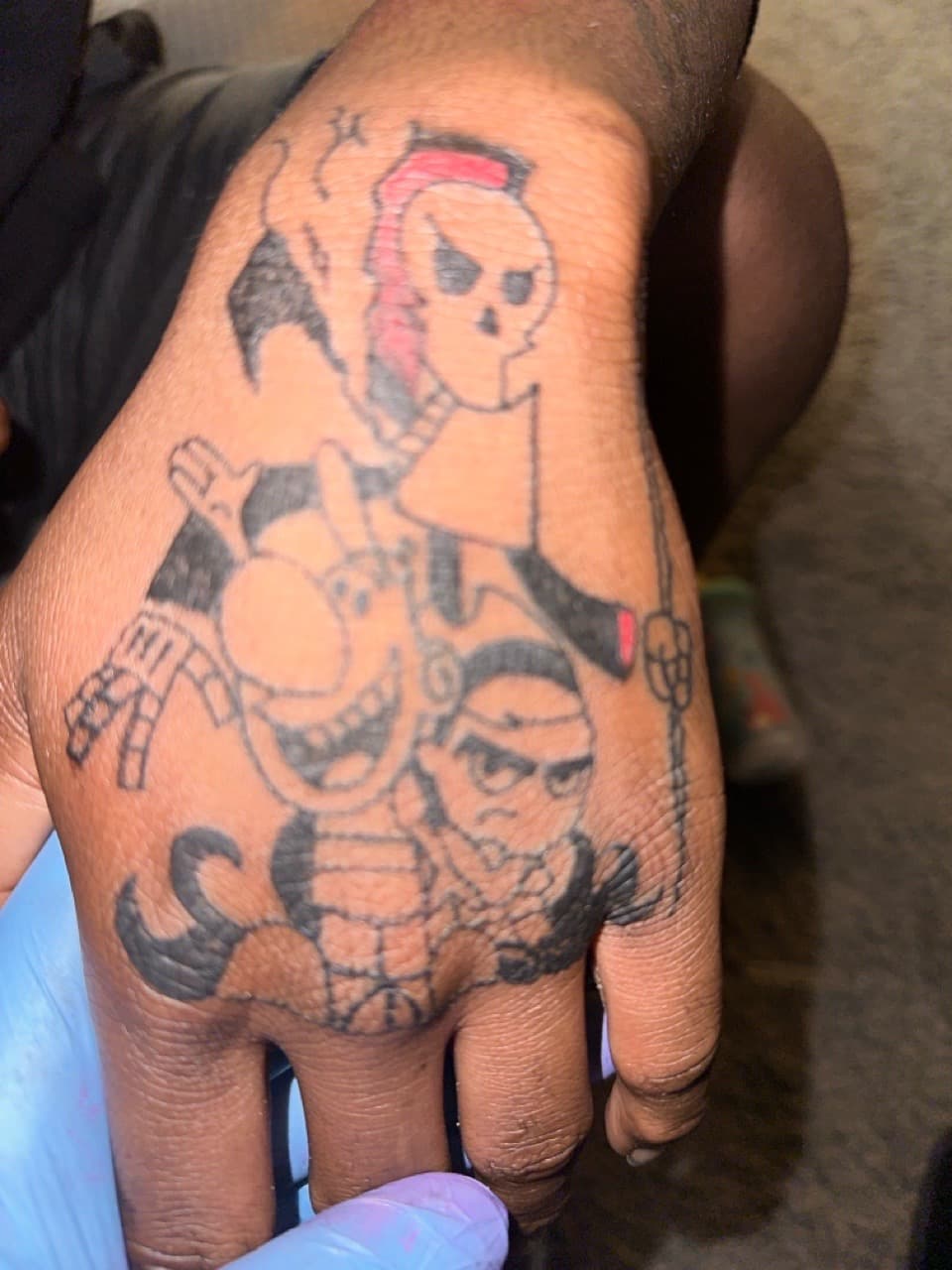 Illustrative + Cartoon skull tattoo on Hand by Edwaun_Randall on TattMe