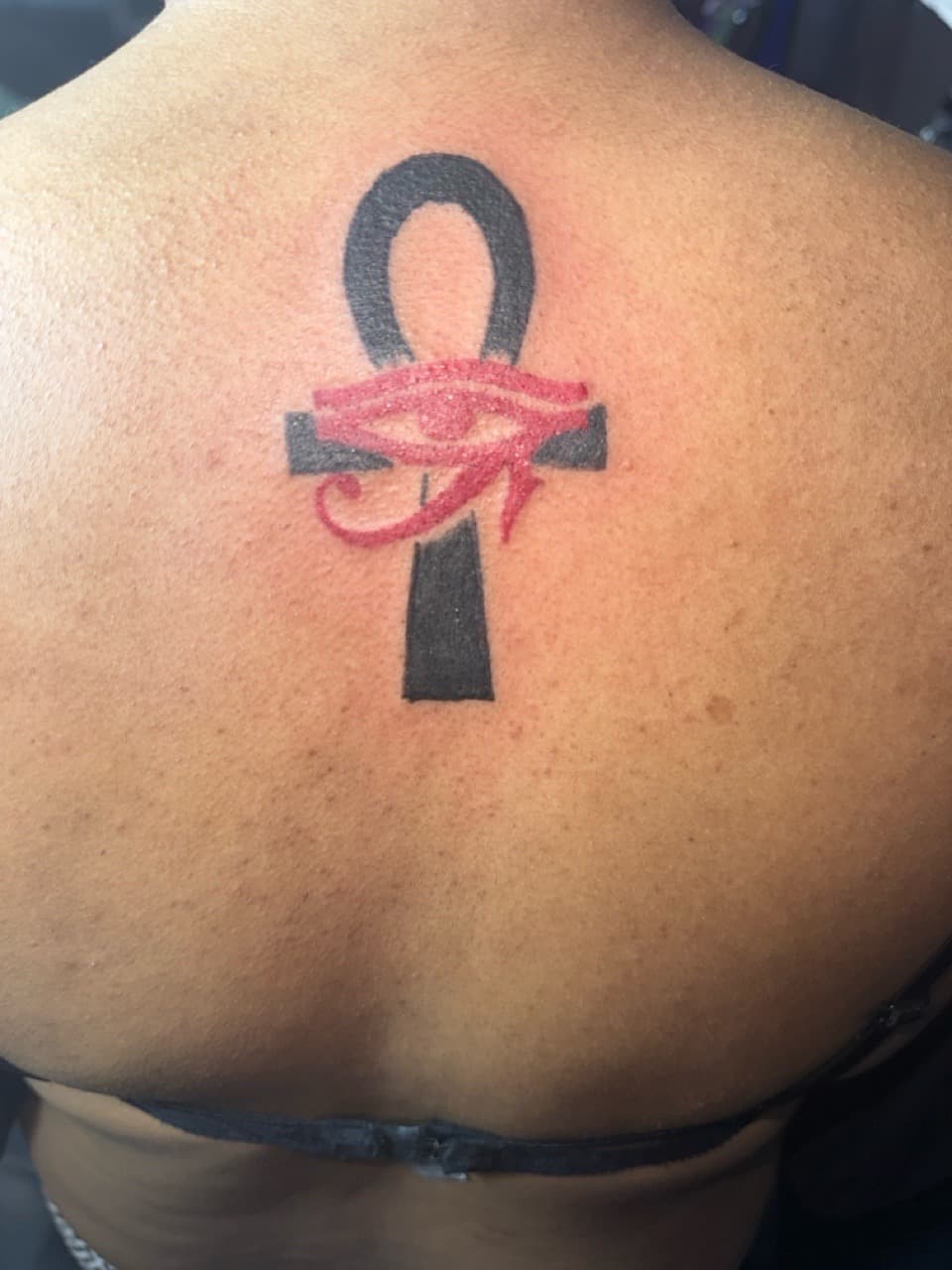 Black-work + Color ankh tattoo on Upper Back by Edwaun_Randall on TattMe