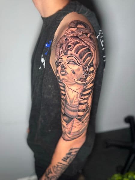 Black & Grey + Realism pharaoh tattoo on Upper Arm by Edwaun_Randall on TattMe