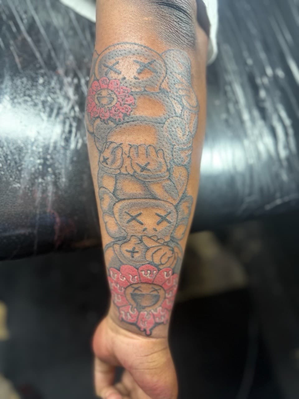 Pop Culture + Color kaws tattoo on Forearm by Edwaun_Randall on TattMe