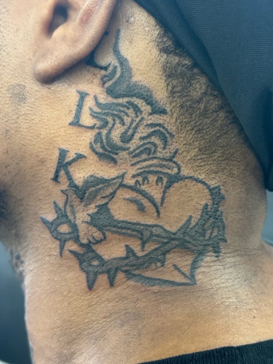Black-work + Tribal letter tattoo on Neck (Side) by Edwaun_Randall on TattMe