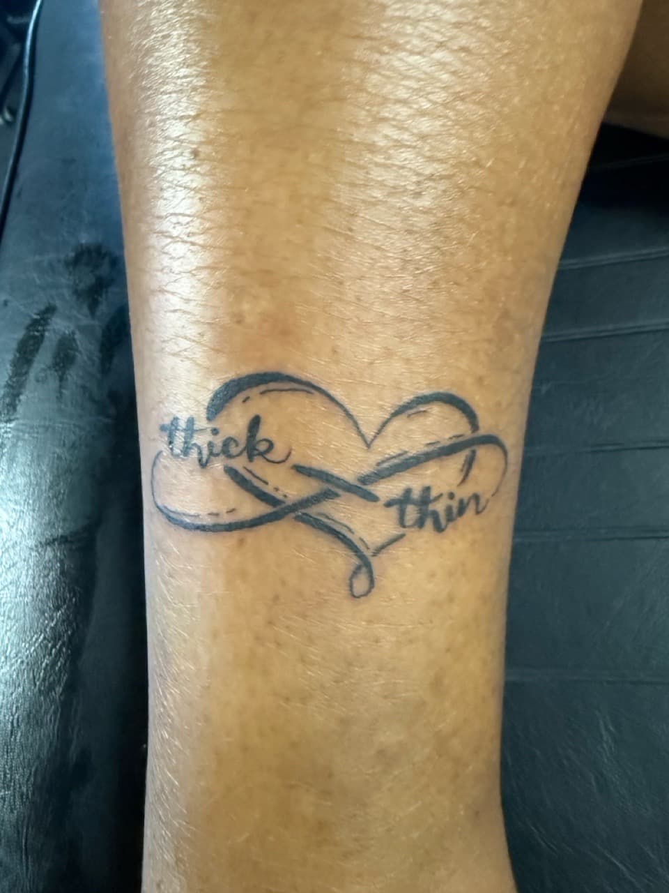 Lettering + Script infinity tattoo on Calf by Edwaun_Randall on TattMe