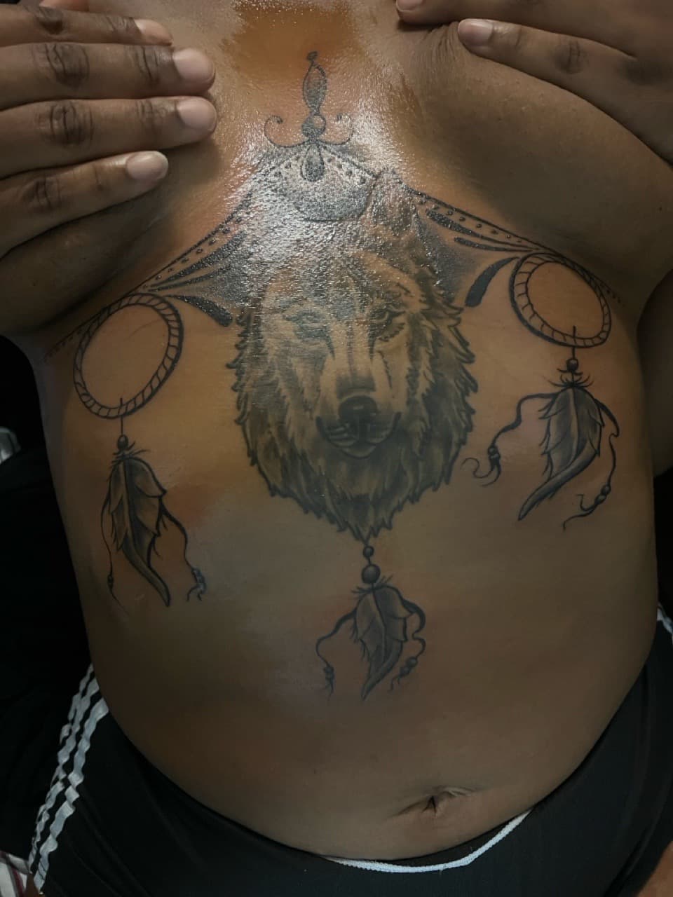 Black & Grey + Illustrative wolf tattoo on Sternum by Mafia_Ink on TattMe