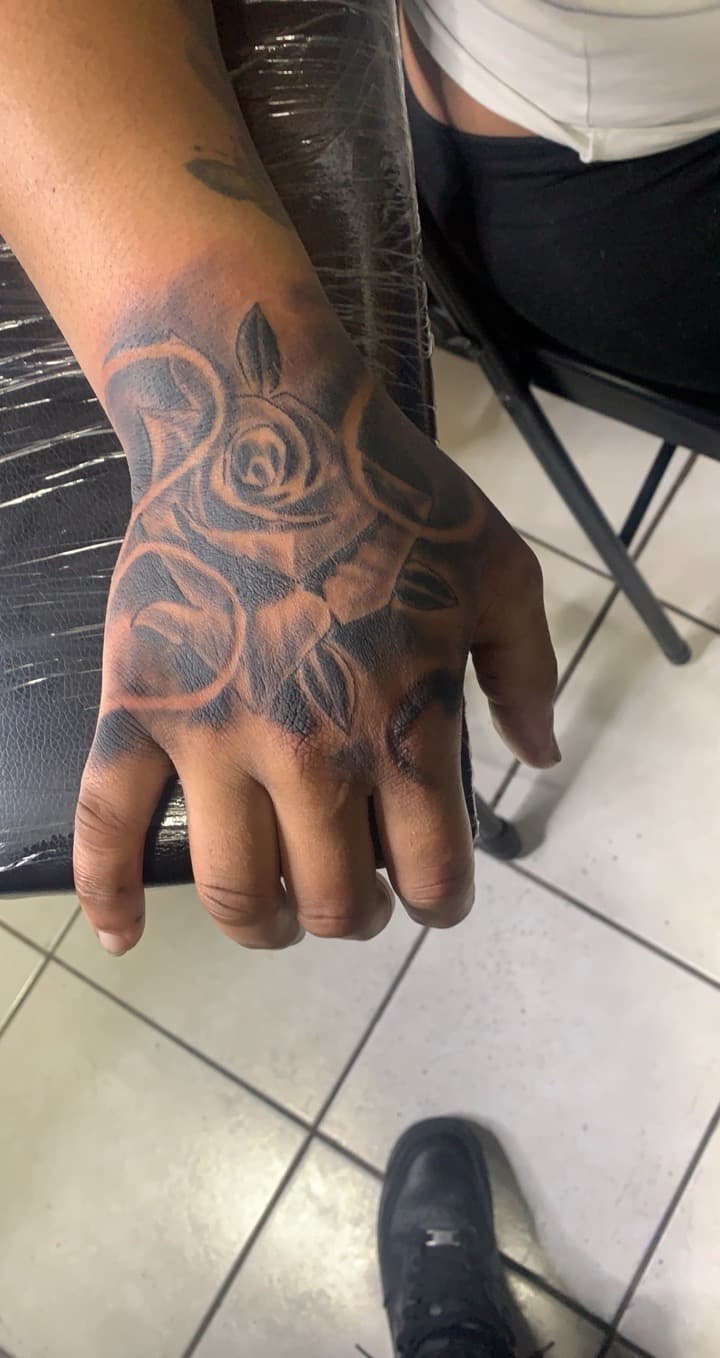 Black & Grey + Floral roses tattoo on Hand by Mafia_Ink on TattMe