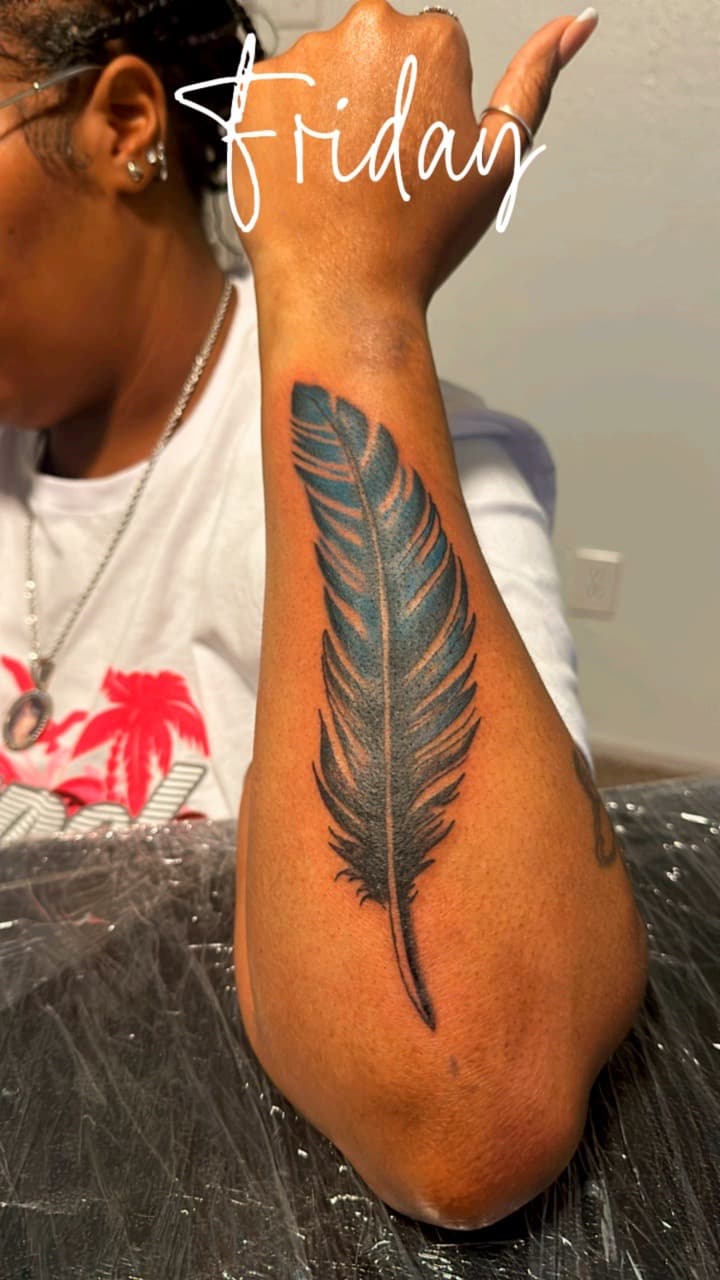 Color + Illustrative feather tattoo on Forearm by Mafia_Ink on TattMe
