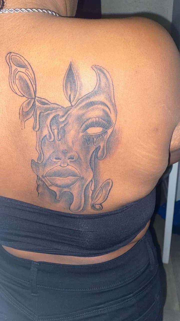 Black & Grey + Illustrative melting tattoo on Upper Back by Mafia_Ink on TattMe