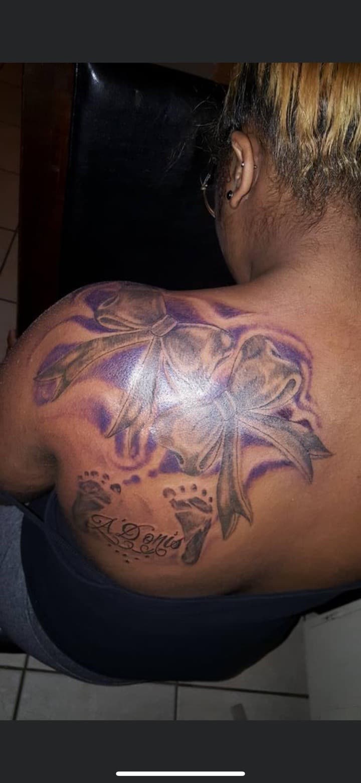 Black & Grey + Script bows tattoo on Upper Back by Mafia_Ink on TattMe
