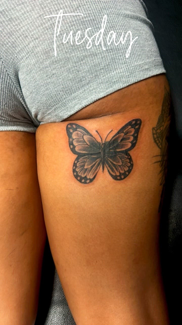 Black & Grey + Illustrative butterfly tattoo on Thigh by Mafia_Ink on TattMe