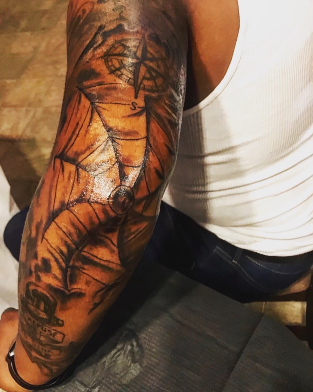 Black & Grey + Illustrative compass tattoo on Elbow by Mafia_Ink on TattMe