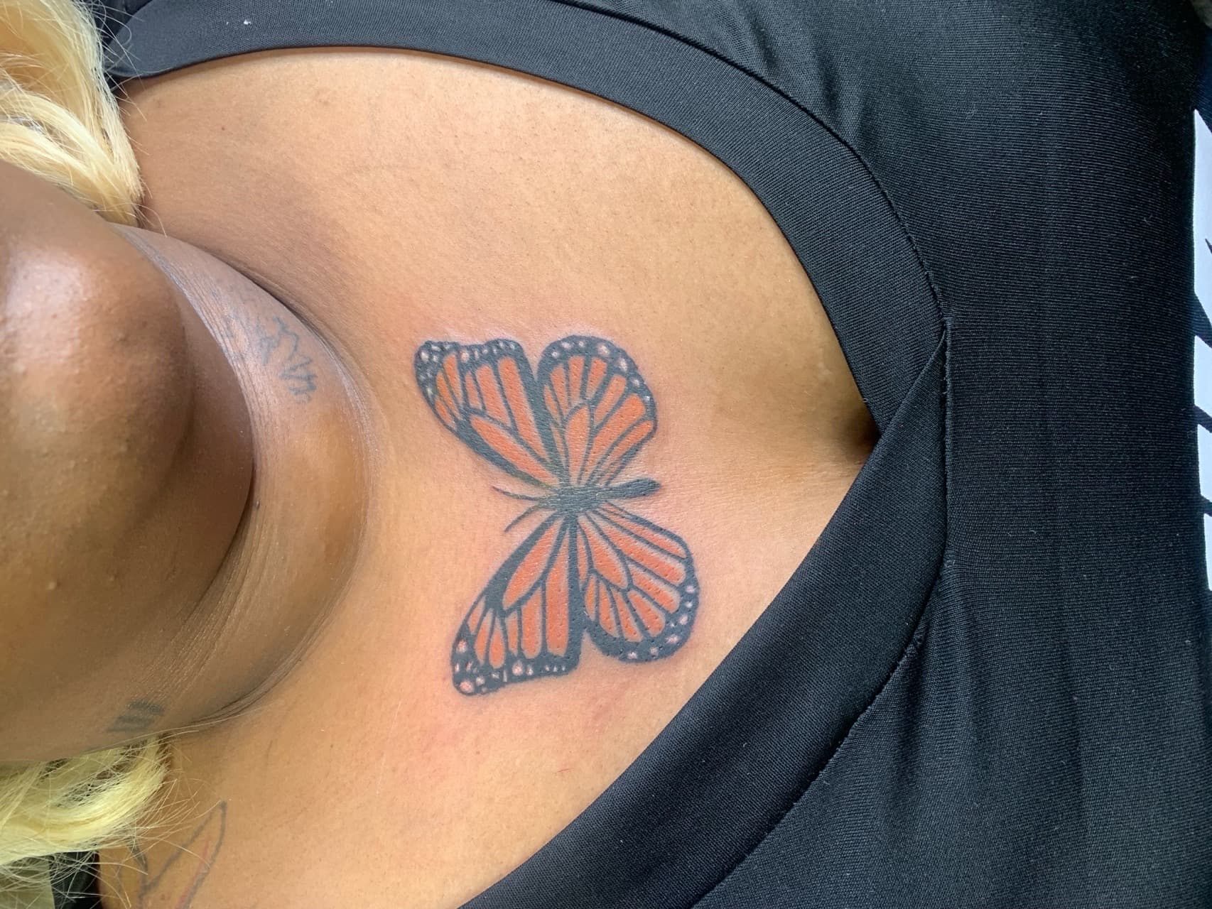 Color + Illustrative butterfly tattoo on Sternum by Mafia_Ink on TattMe
