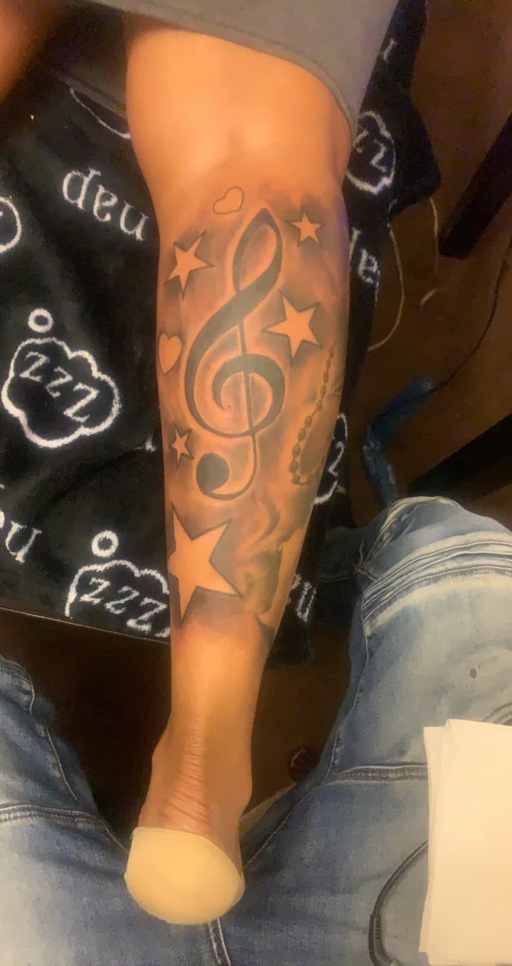 Black & Grey + Illustrative treble clef tattoo on Calf by Mafia_Ink on TattMe