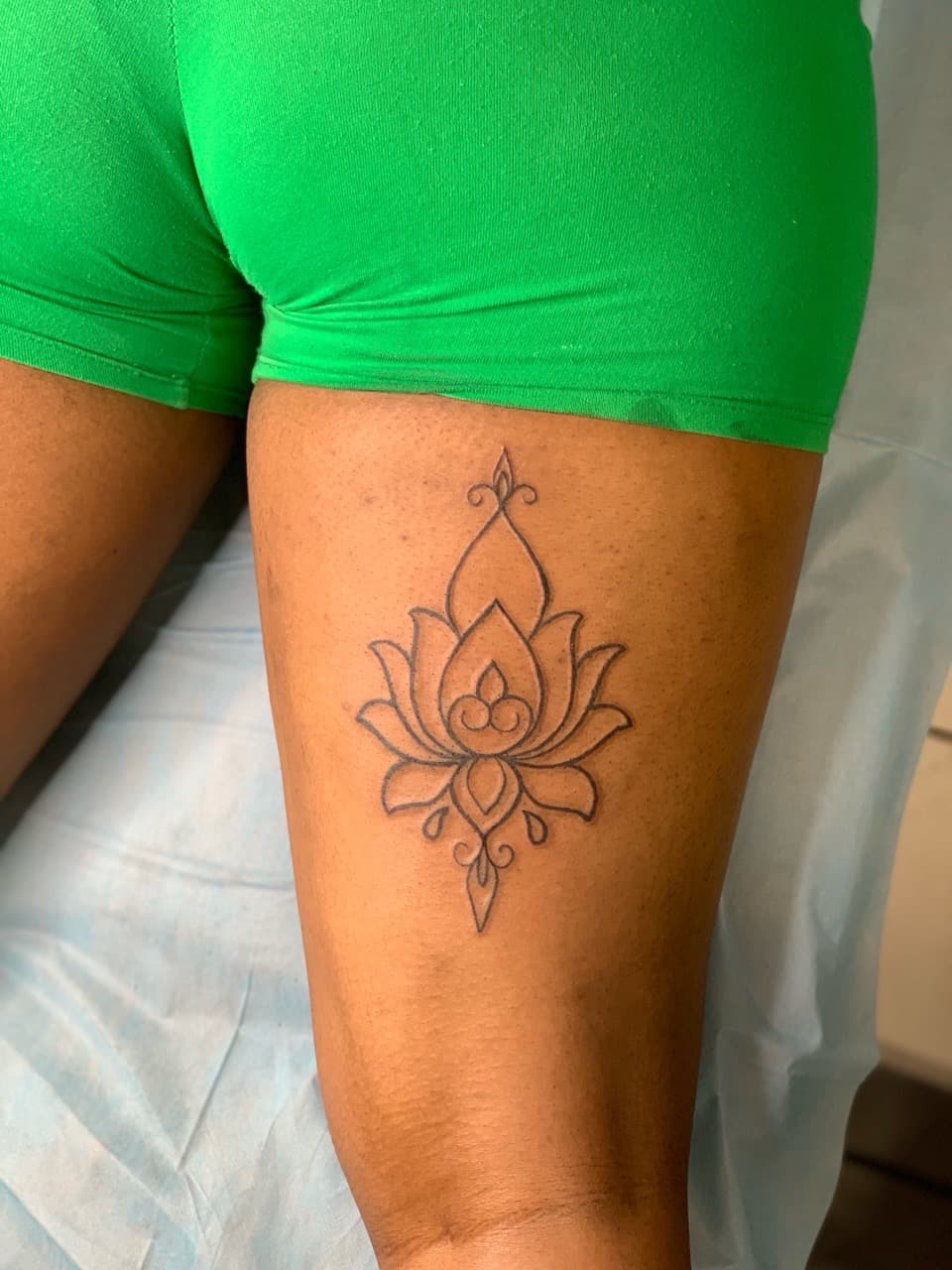 Fine Line + Black-work lotus tattoo on Thigh by Mafia_Ink on TattMe