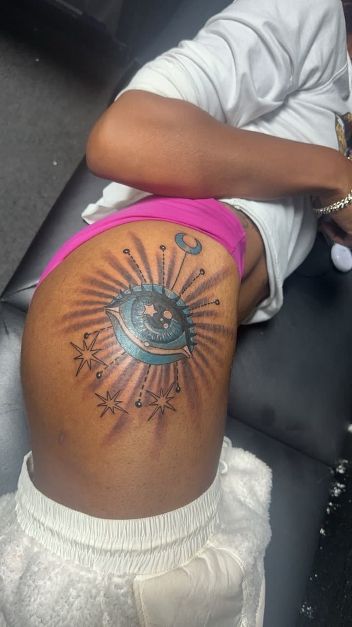 Illustrative + Color eye tattoo on Hip by Mafia_Ink on TattMe