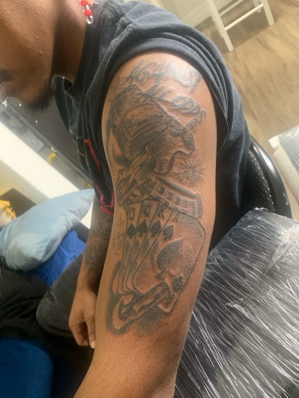 Black & Grey + Illustrative money tattoo on Upper Arm by Mafia_Ink on TattMe