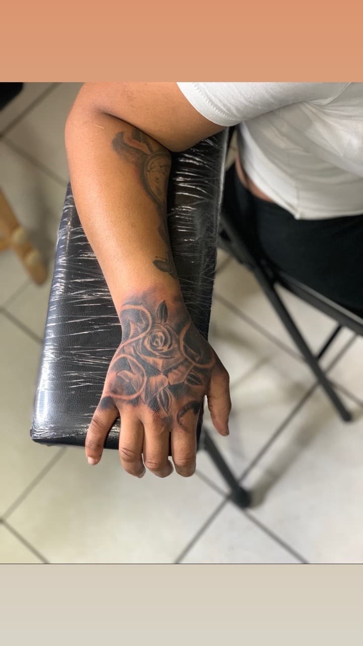 Black & Grey + Floral roses tattoo on Hand by Mafia_Ink on TattMe