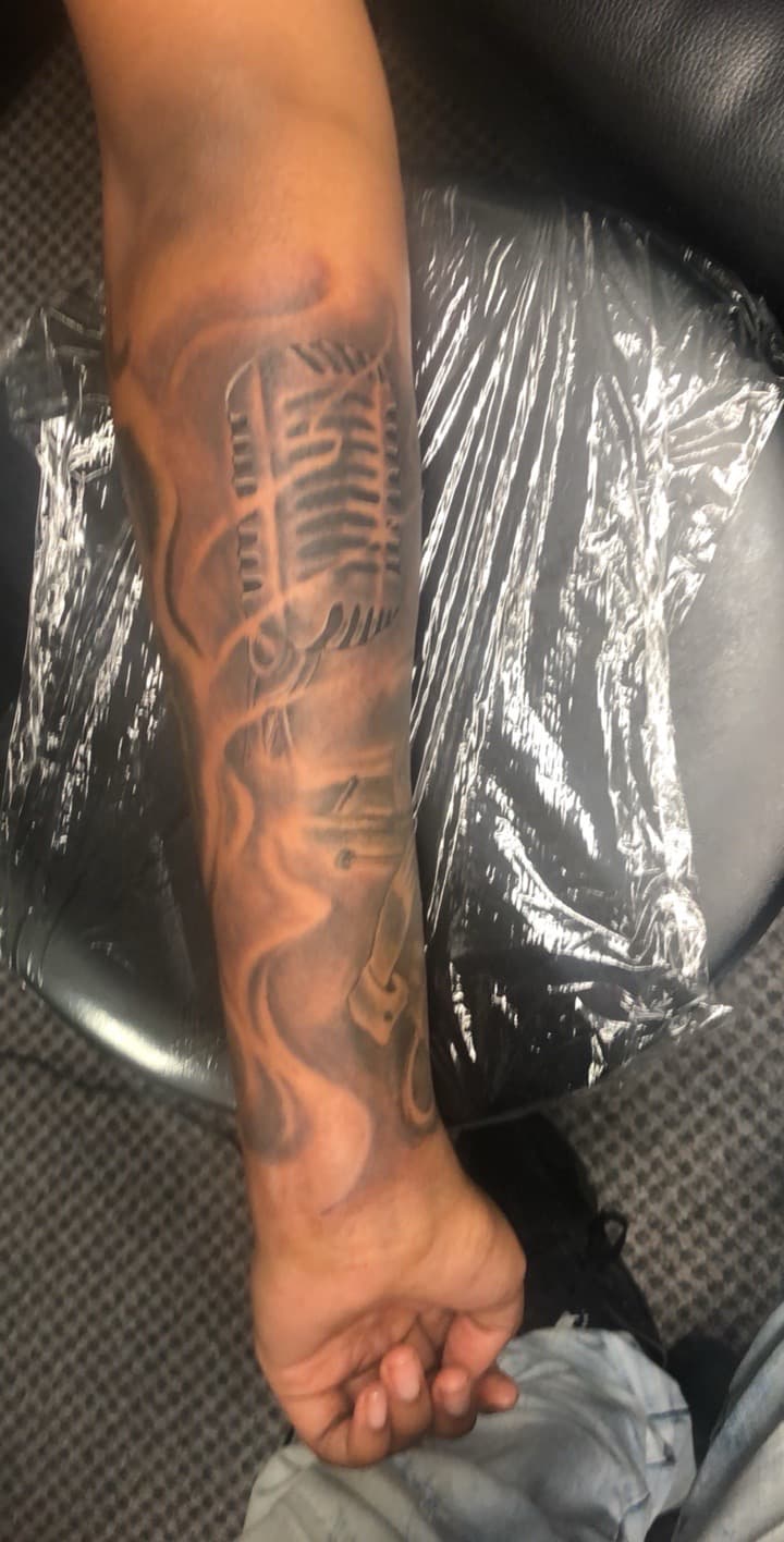 Black & Grey + Illustrative microphone tattoo on Forearm by Mafia_Ink on TattMe