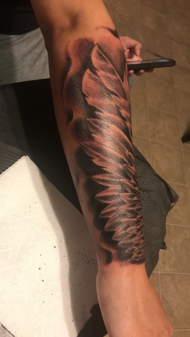 Black & Grey + Illustrative wings tattoo on Forearm by Mafia_Ink on TattMe