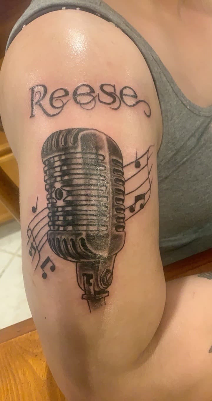 Black & Grey + Lettering microphone tattoo on Upper Arm by Mafia_Ink on TattMe