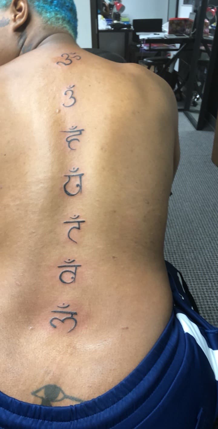 Black-work + Script symbols tattoo on Spine by Mafia_Ink on TattMe