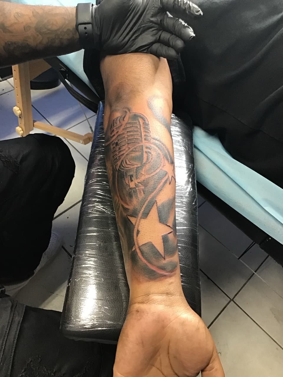 Black & Grey + Illustrative microphone tattoo on Forearm by Mafia_Ink on TattMe