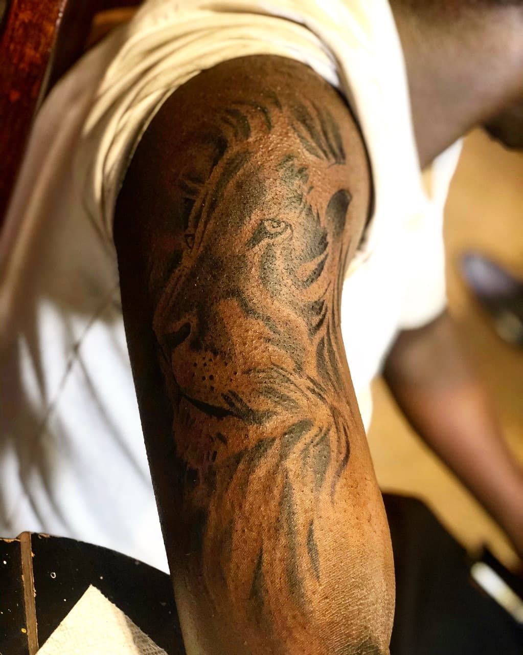 Black & Grey + Realism lion tattoo on Upper Arm by Mafia_Ink on TattMe