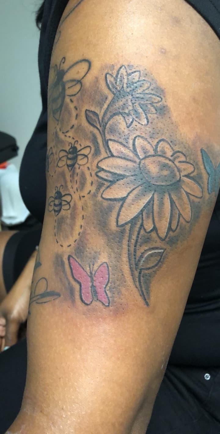 Floral + Illustrative flowers tattoo on Upper Arm by Mafia_Ink on TattMe