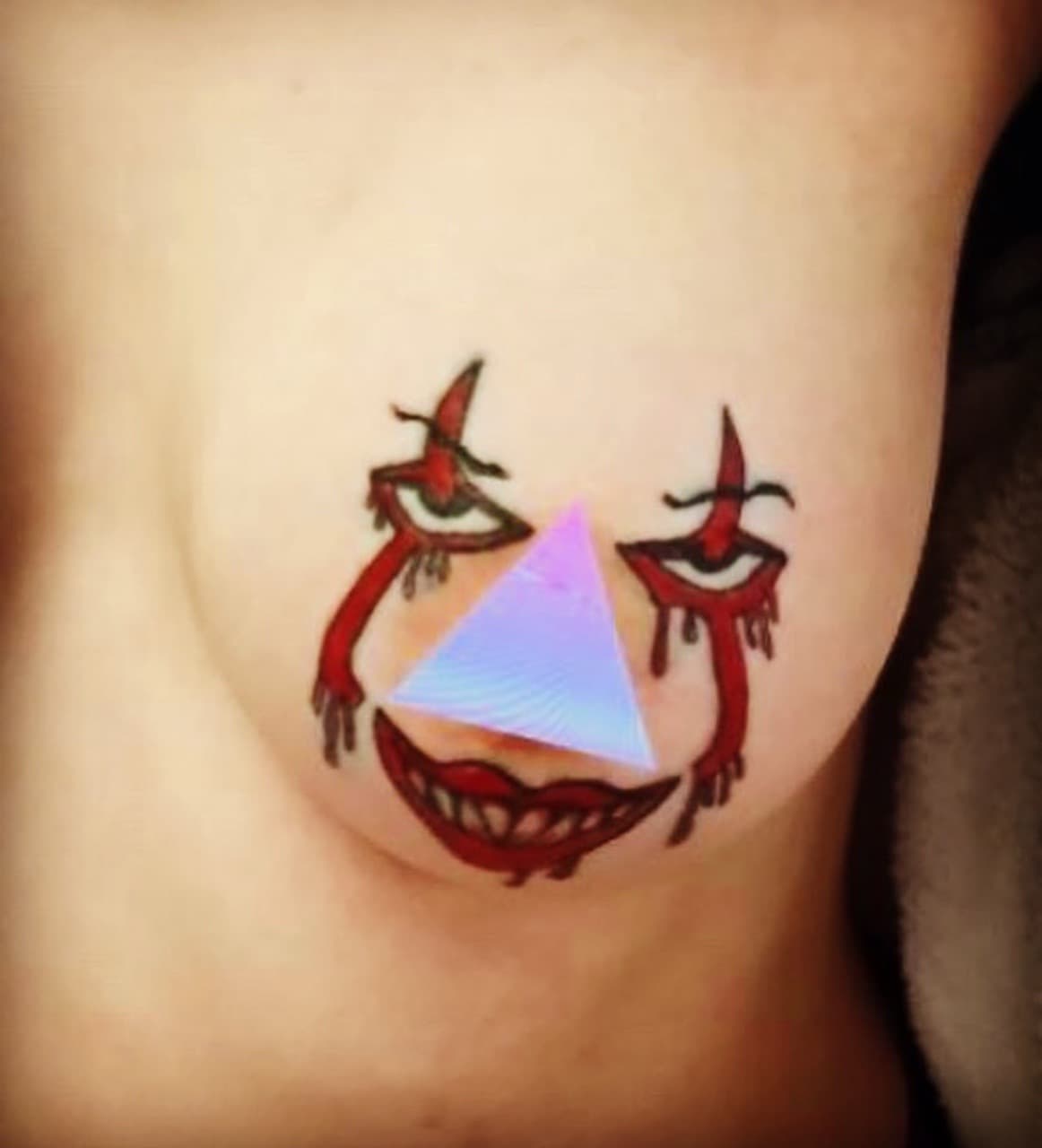 Illustrative + Color clown tattoo on Chest by Bass on TattMe